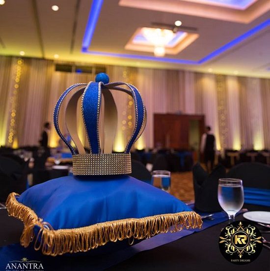 crown on royal blue cushion