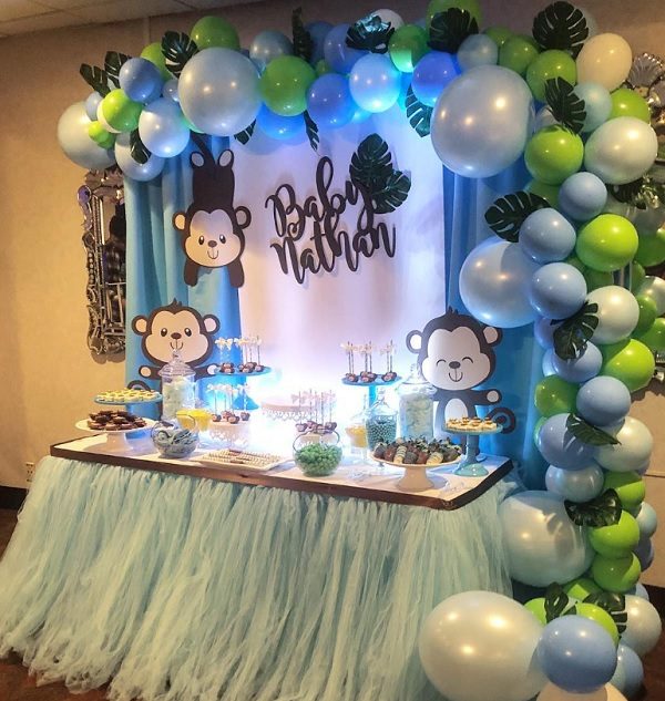 cute Monkey themed party Candy Dessert Table with balloon garland