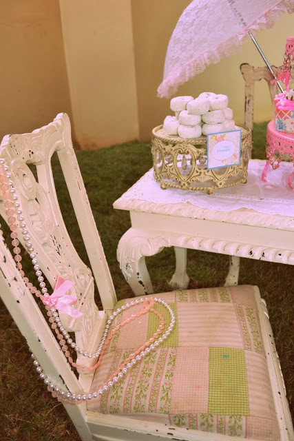 A Vintage Shabby Chic Chair with pearls
