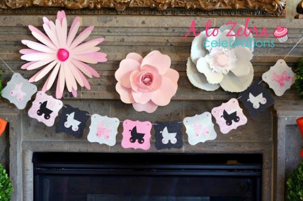 parisian themed paper flowers and banner