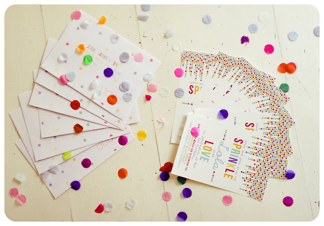 paper confetti on invitation card