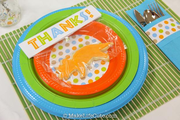 dinosaur themed baby shower table setting cookie