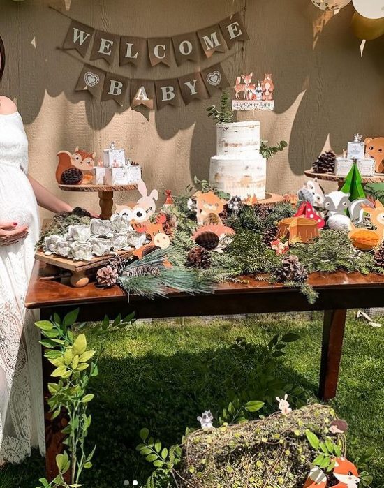 woodland baby shower pinecones and greenery