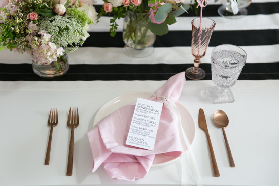 pink napkin, gold cutlery set, xoxo black and white baby shower