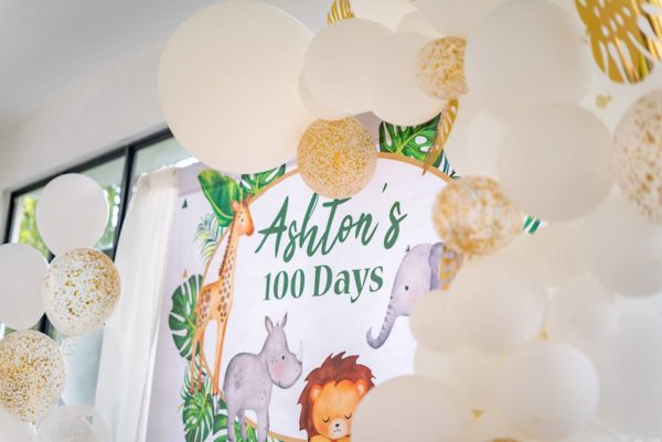 gold-confetti-and-white-balloons-for-safari-party