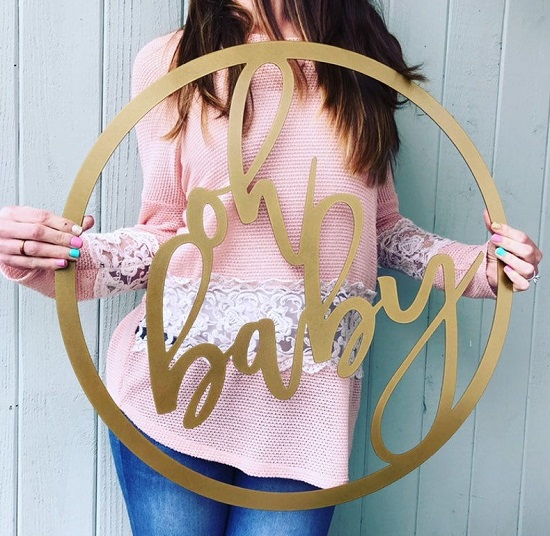 Oh Baby Baby Shower metal backdrop idea