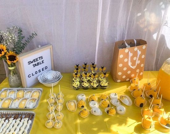 sunflower and bees gender reveal sweet table treats