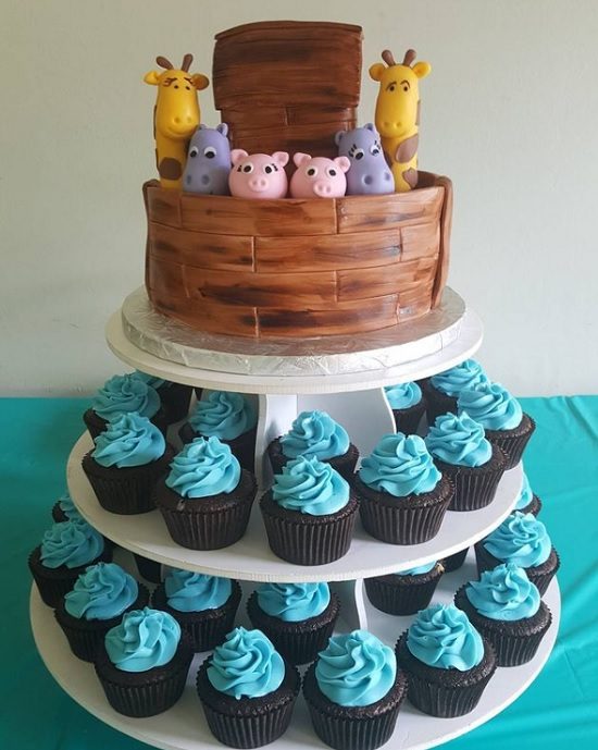 Noahs ark baby shower cake with blue cupcakes