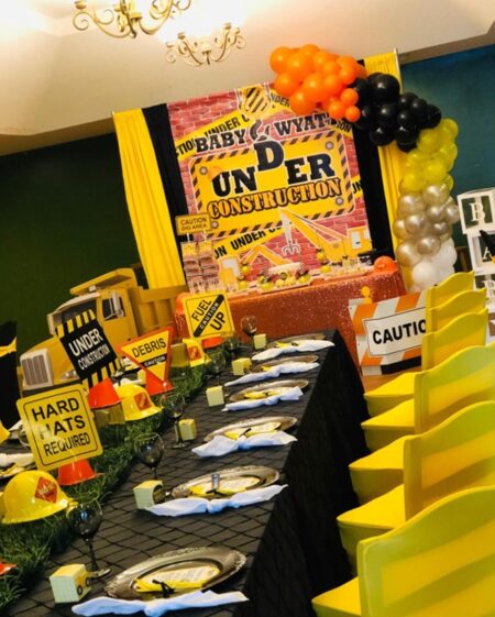 baby under construction guest table setup decors