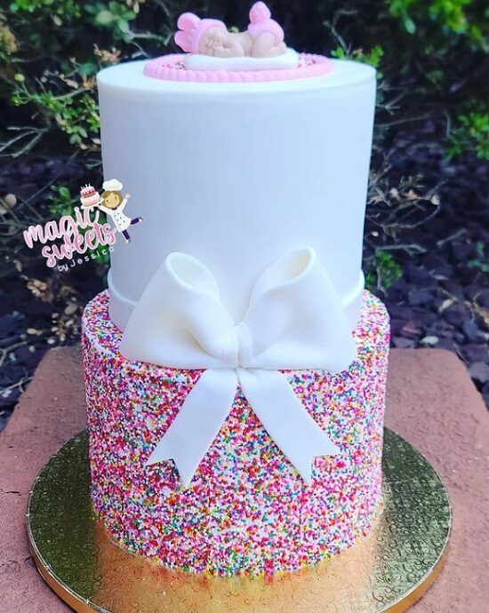girl sprinkle baby shower cake