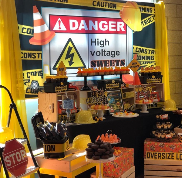 high voltage sweets baby under construction dessert table