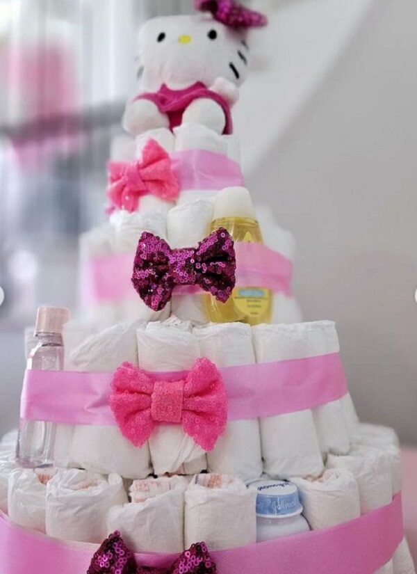 pink and glittery hello kitty diaper cake