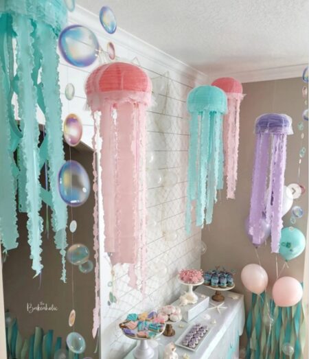 hanging jellyfish, beautiful seaweed climbing the walls, giant seahorse balloons, and bubbles