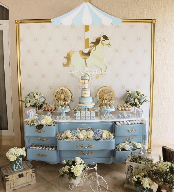 beautiful carousel baby shower table setup for boy