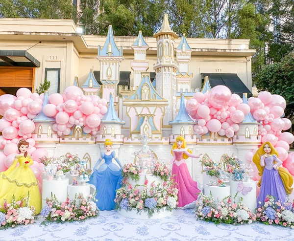Disney princesses in the garden of the residence