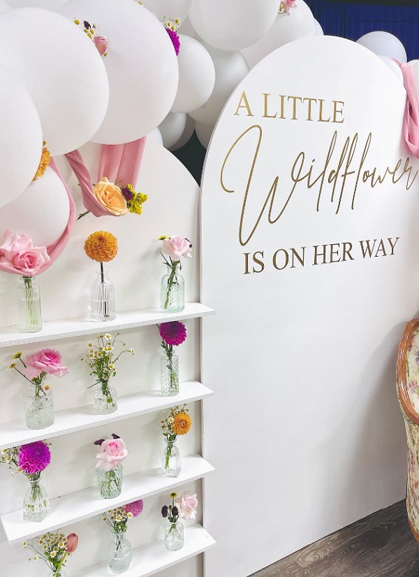 a little wildflower is on her way flower in bottles