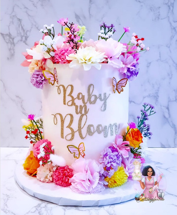 baby in bloom wildflower cake
