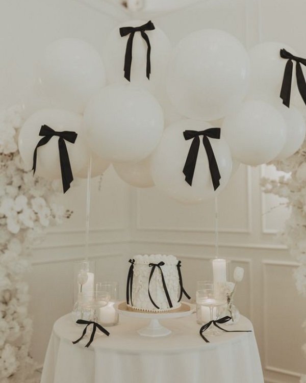 elegant black ribbons and balloons