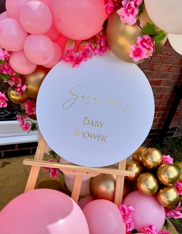 pink and gold cherry blossom welcome sign