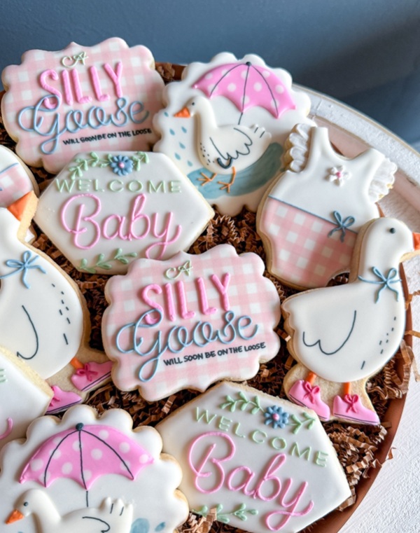girl pink goose baby shower cookies