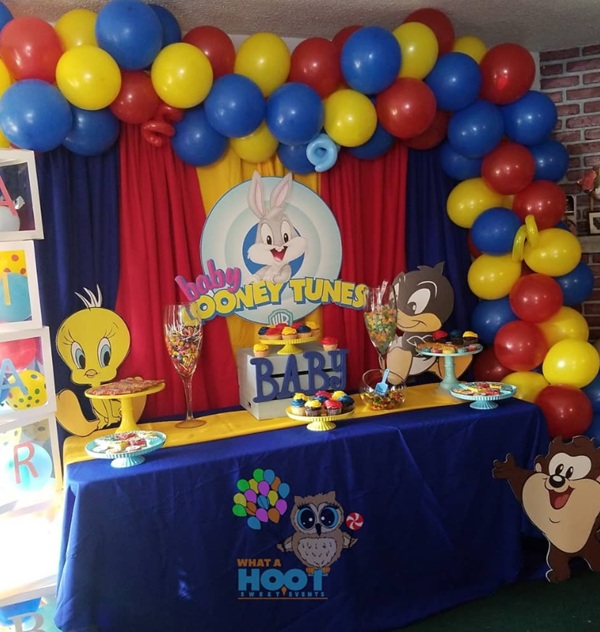 colorful Baby Looney Tunes Baby Shower dessert table