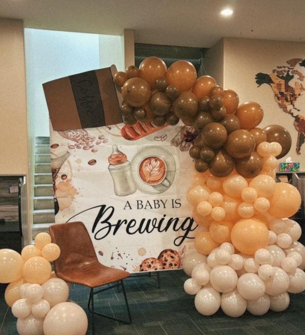 baby is brewing coffee backdrop and balloons