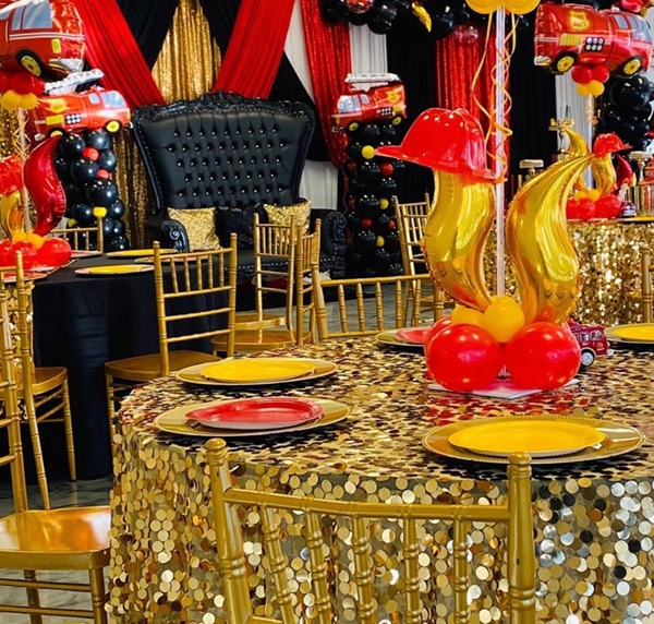 glamorous fire truck baby shower setup