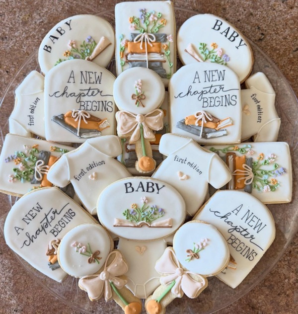 new chapter begins baby shower cookies