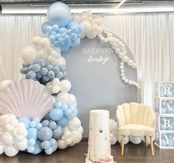 dreamy under-the-sea baby shower soft balloon waves and seashell details