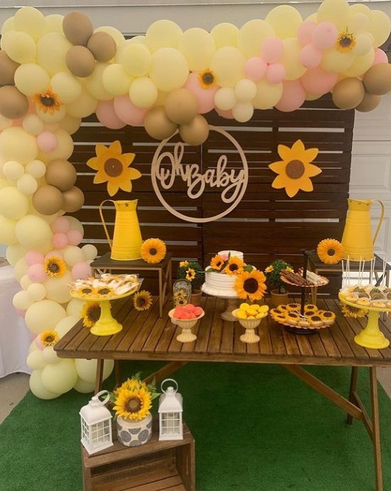 outdoor sunflower and sunshine baby shower set up