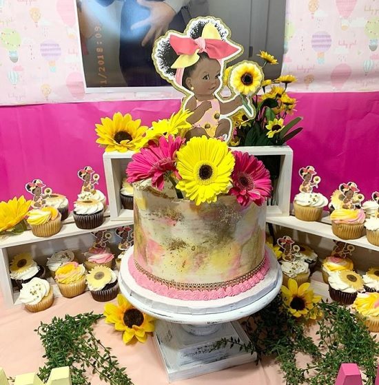 pink and yellow sunflower baby shower cake