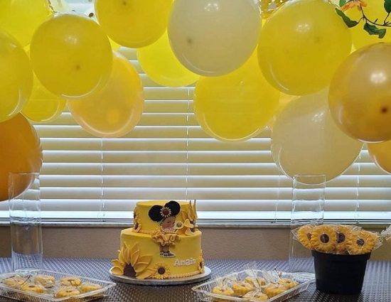 sunflower baby girl cake